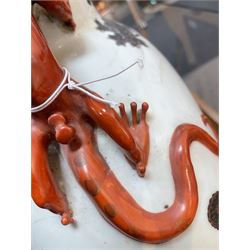 Chinese Republic period porcelain moon flask vase, of typical compressed spherical form, the neck and shoulders with applied iron red dragon handles, the body decorated in iron-red and grisaille with a 'one hundred children' design, depicting various children at play and engaged in musical pursuits within a garden setting, with apocryphal Qianlong mark beneath, H47cm