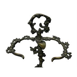 Pair of cast brass hallway umbrella or stick stands, in the form of a tree decorated with trailing flowering foliage branches, the stem with hunting horn over leaning shotgun, shaped naturalist tray base with hunting hound and out splayed foliate cast feet 