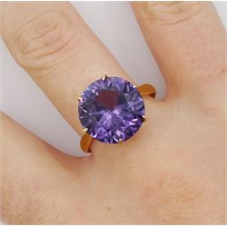 Gold round synthetic purple stone ring, stamped 18K