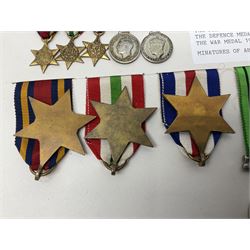 Representative display of WWII Campaign Stars and Medals comprising Burma Star, Italy Star, France & Germany Star, Defence Medal and War Medal 1939-1945; together with the corresponding group of miniatures; all with ribbons