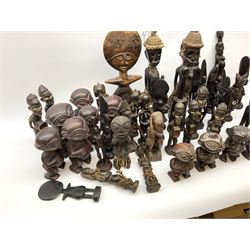 African carved wood figures, various forms and sizes including some with rope decoration, in two boxes