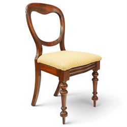 Set of eight mahogany balloon-back dining chairs, drop-in seats upholstered in yellow patterned fabric, raised on turned-front and rear-splayed supports