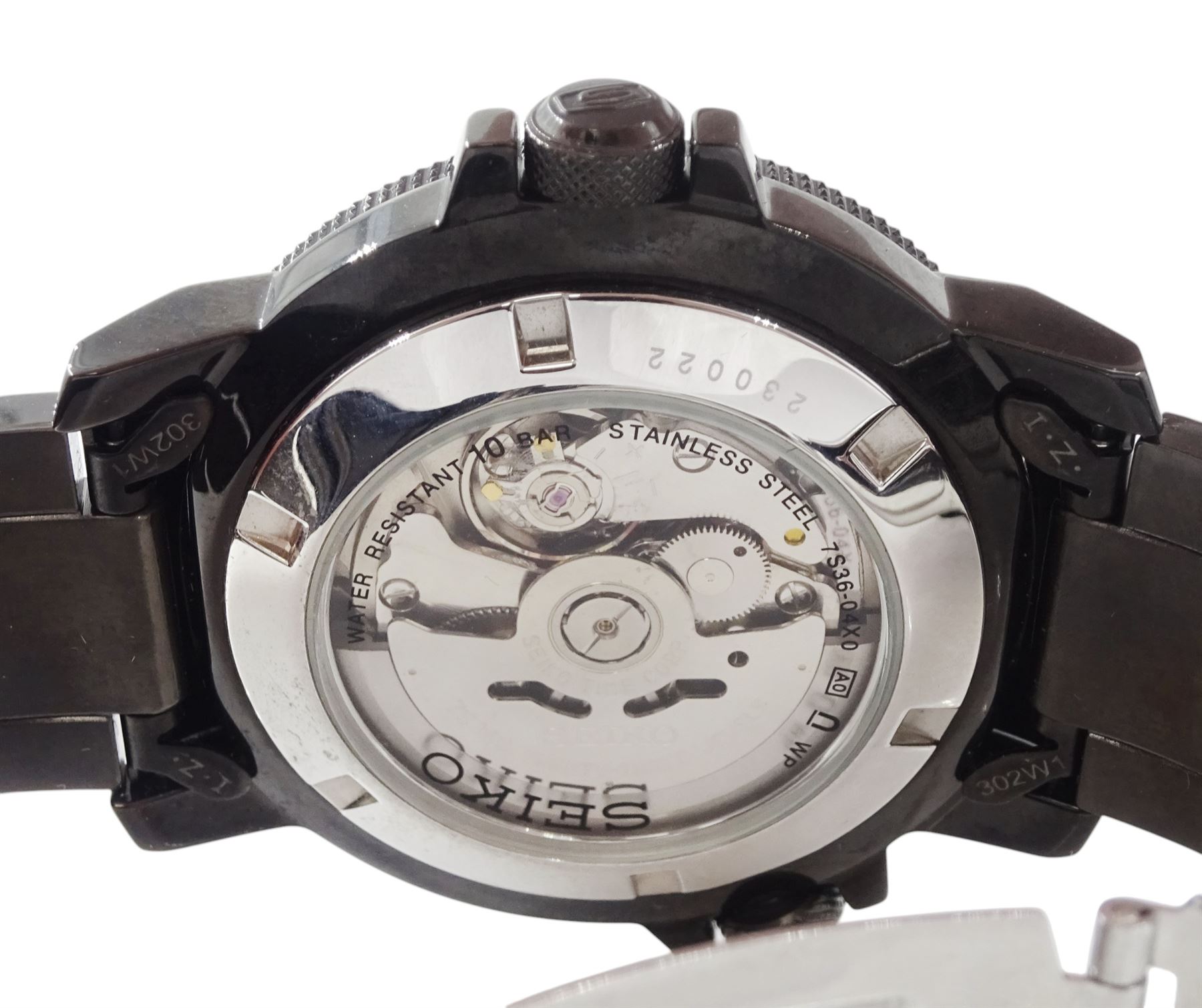 Seiko 5 Sports gentleman's stainless steel automatic wristwatch, Ref. 7S36-04N0, black dial with gilt baton hour markers and one other Seiko 5 Sports, Ref. 7S36-04X0, with grey dial and baton hour markers, both with day-date apertures and exhibition back cases, one boxed