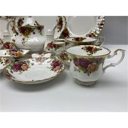 Royal Albert Country Roses pattern part tea and dinner service, to include teapot, four cups and saucers, four dessert plates, cake plate etc, (41)