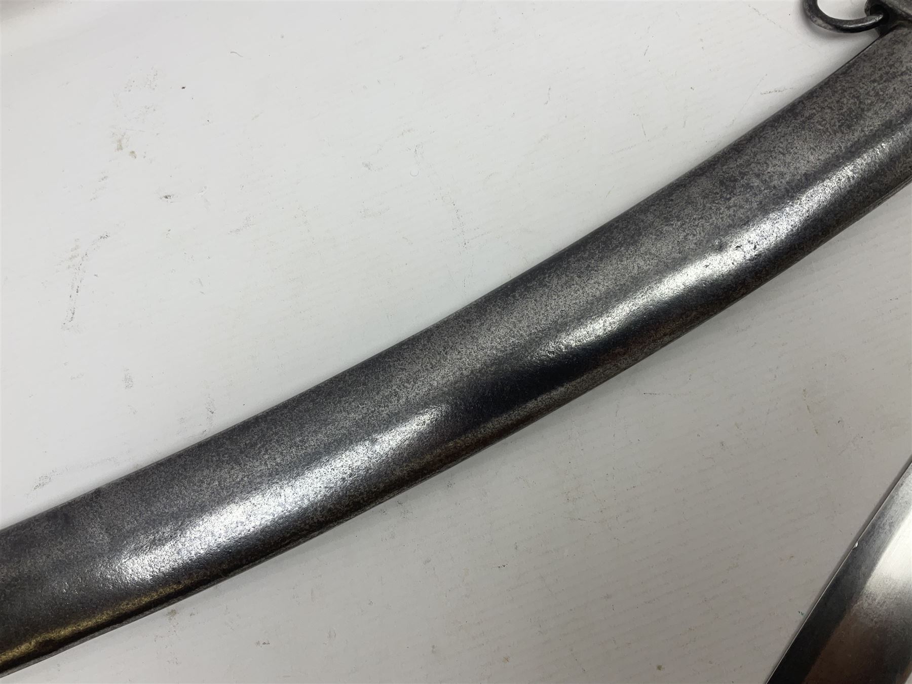 British 1796 Pattern Light Cavalry trooper's sword, the 84cm curving fullered blade stamped Hadley.1 to the back edge, steel hilt with knucklebow, D-shaped langets and leather grip; in polished steel scabbard stamped Osborn & Gunby Birmm. and W.R.16 ( ?16th Light Dragoons) with two suspension rings L100cm overall