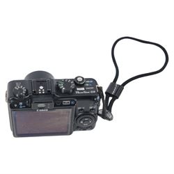 Two Canon Ixus IX240 compact digital cameras, both boxed, together with a Canon PowerShot G9 compact digital camera with a Canon 7.4-44.4mm 1:2.8-4.8 zoom lens (3)