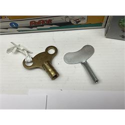 Twenty six tinplate models to include Ferris Wheel and Performing Circus Elephant, marked JW, further similar examples such as Duck on a Bike, Clown on Roller, Carousel; Popeye Tin Speedboat; Looney Tunes Wind Up Cars and Express Train; various international examples, MS107 Jumping Bambi, Pop Pop Boat, jumping frogs, pecking chickens etc; both boxed and loose