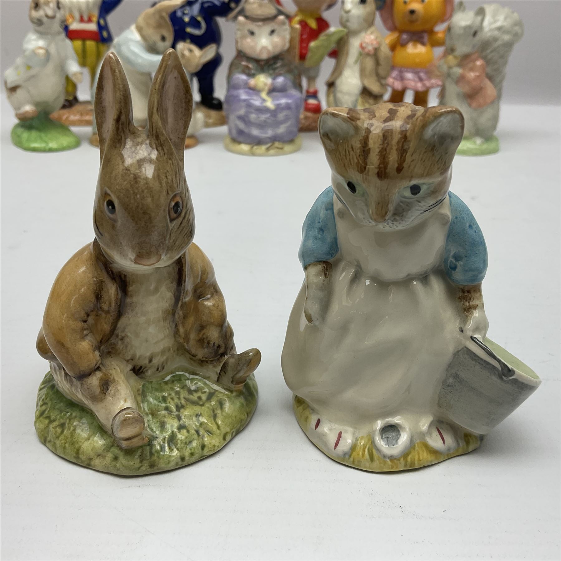 Twelve Royal Albert Beatrix Potter figures, including Mr Alderman Ptolemy, Peter Rabbit and This Pig Had None, etc, some boxed, together with four Royal Worcester Noddy figures, including Big Ears and PC Plod, boxed