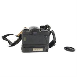 Leica R-E camera body serial no. 1752690, in black finish, with a Leitz Summicron-R 1:2/50 E55 lens serial no. 3480570, with Leica GMBH motor winder R serial no. 61596