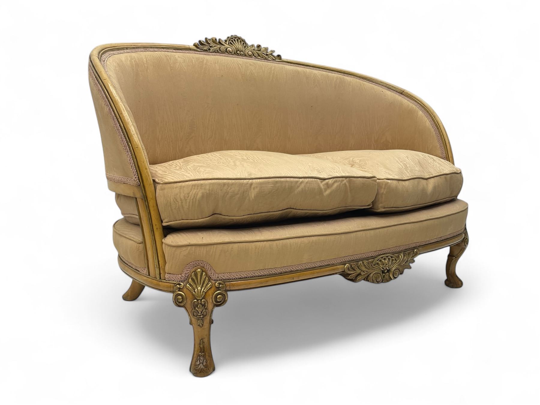 French Louis XV design walnut framed sofa, tub-shaped upholstered back with gilt foliate carved crest, padded seat with twin loose cushions, raised on cabriole supports with shell and acanthus leaf carvings
