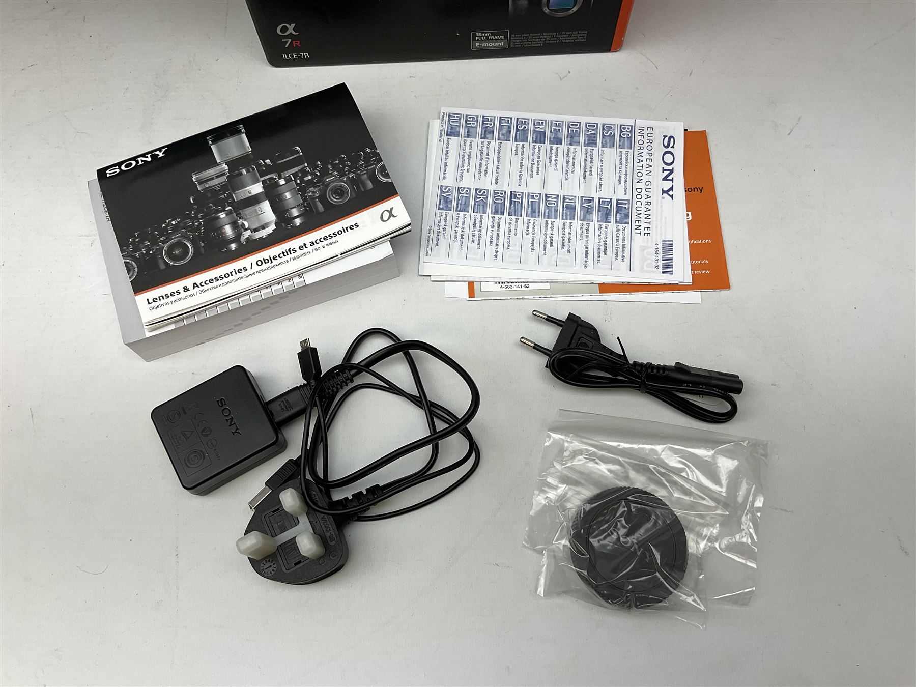 Sony Alpha 7R ILCE-7R camera serial number 3985636, with a 'Carl Zeiss Sonnar FE 1.8/55 ZA' lens, 'FE 28mm F2' lens, Sony Handycam Cyber-Shot HVL-F43M, all with original boxes, together with a Manfrotto camera bag  