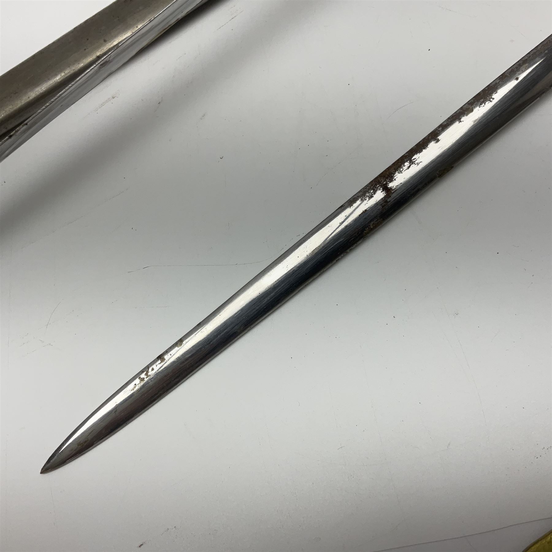 Reproduction American Civil War Cavalry trooper's sword, the 88cm slightly curving fullered steel blade marked to the ricasso 'Ames & Co Chicopee Mass.' and 'US ADK 1862'; brass hilt and leather covered grip; in steel scabbard; and Indian reproduction 19th century French court sword (2)