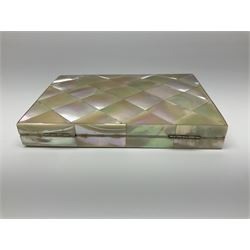 Victorian mother of pearl tea caddy, of rectangular bow-fronted form, the body with floral, bird and geometric engraved mother of pearl panels, white metal shield plaque to the cover inscribed with the initials G.J.A and similar escutcheon, the two division interior with ivory edging and two panelled mother of pearl lids, on four vegetable ivory bun feet L20cm, together with a similar style mother of pearl card case (2) This item has been registered for sale under Section 10 of the APHA Ivory Act