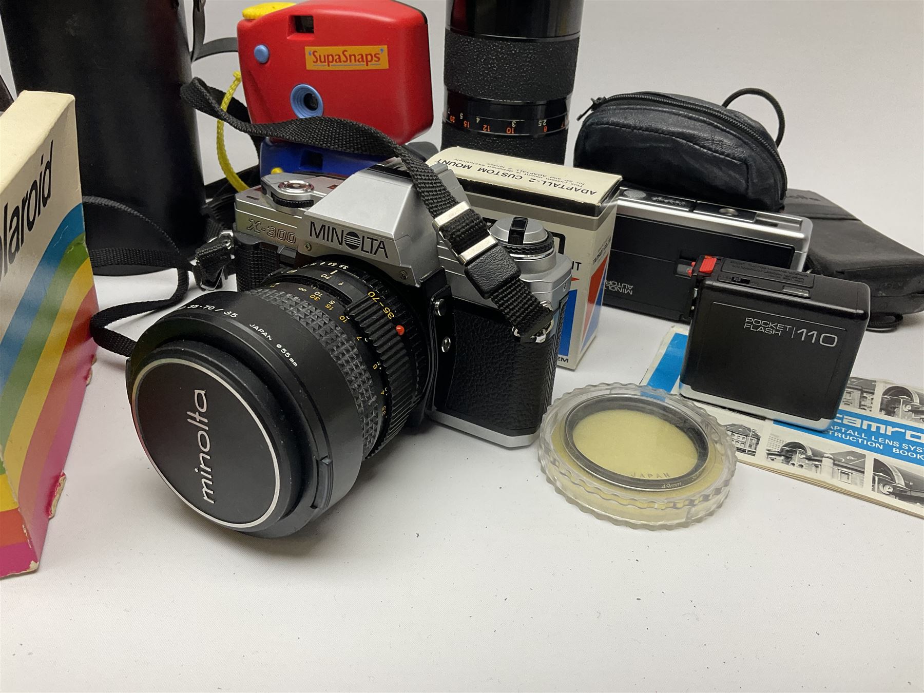 Vintage and later cameras and accessories including Minolta X-300 in carry bag, Tamron lens etc