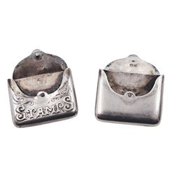 Two Edwardian silver stamp holders modelled in the form of envelopes, the first example detailed 'Stamps', hallmarked Crisford & Norris Ltd, Birmingham 1903, the second of plain form, hallmarked Crisford & Norris Ltd, Birmingham 1902, approximate total weight 0.38 ozt (11.8 grams)