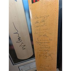 Signed England and Yorkshire cricket memorabilia, including framed bat signed by Michael Vaughn, signed photograph of England team, signed Yorkshire shirt and a signed bat
