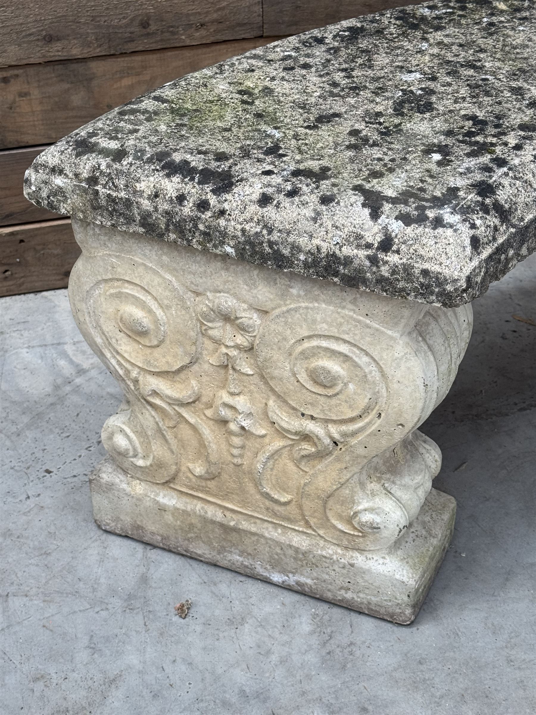 Curved cast stone bench
