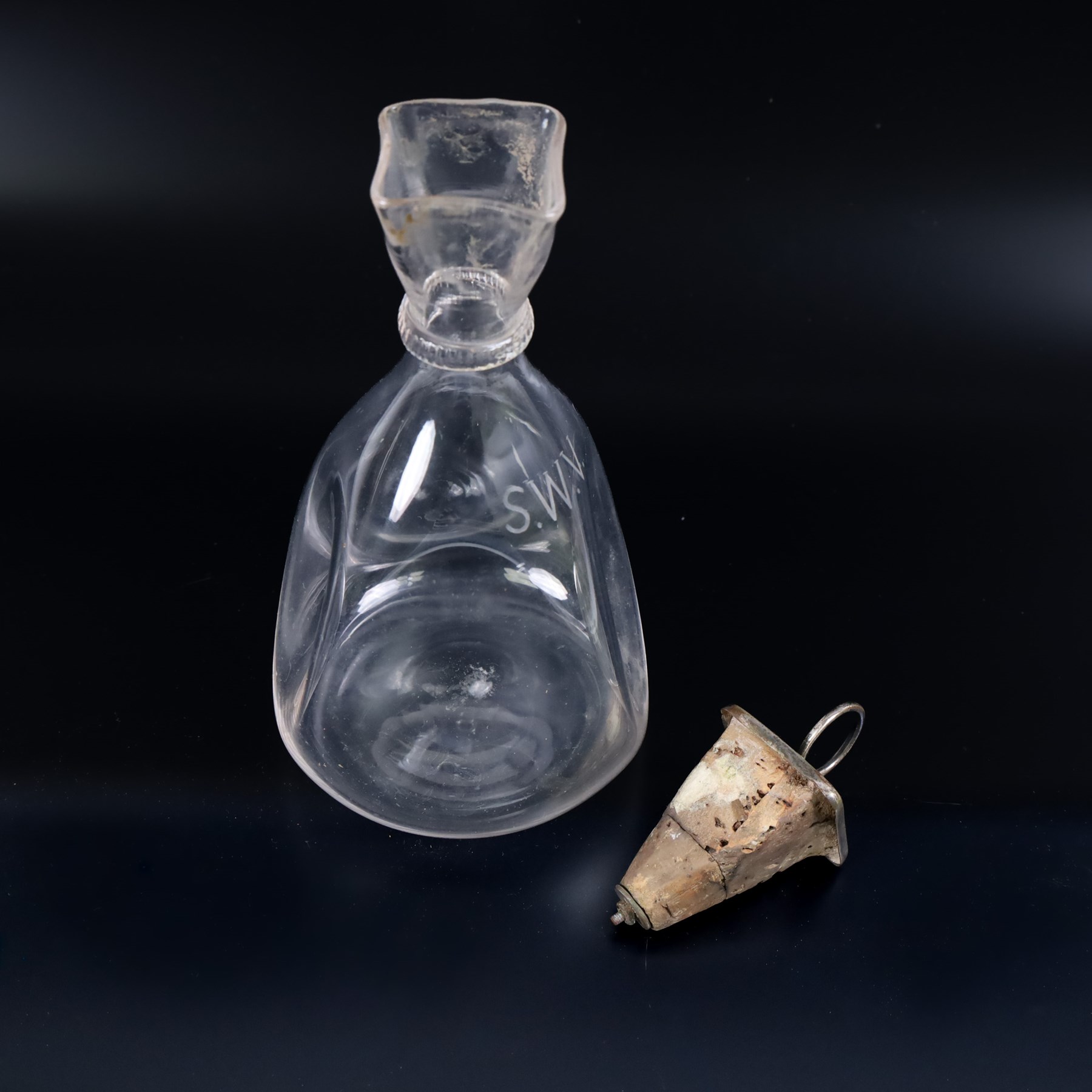 Four Arts and Crafts drinking glasses of dimple form, probably James Powell, Whitefriars, together with a dimple decanter, glasses H12cm