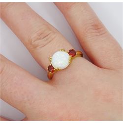 Silver-gilt three stone opal and garnet ring, stamped 925