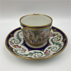 19th Sèvres style porcelain cup and saucer, the cup painted with a figural scene, against a scalloped border of scrolling floral swags on a blue ground, together with a Sèvres soft paste porcelain coffee can and saucer, painted with panels of exotic birds, roses and a border of cornflowers, LL monogram enclosing date letters H above painters mark, coffee can H6.5cm, saucer D13.5cm (2)