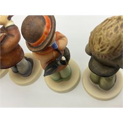 Thirty Hummel figures by Goebel, to include Saluting the Peacekeepers of Operation Joint Endeavor, on wooden plinth, Call to Glory, Celebrate with Song and Soldier Boy