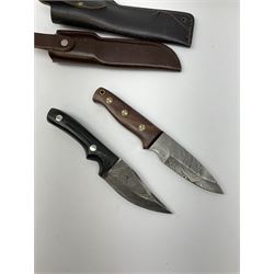 Perkin hunting knife with 10.5cm damascus blade stamped PERKIN and metal studded hardwood handle L20.5cm; and another similar unmarked hunting knife; each in leather sheath (2)