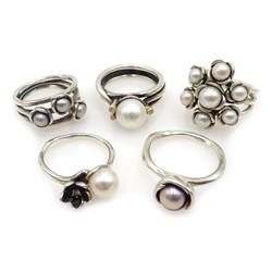  Pandora silver pearl and diamond ring and four other Pandora silver pearl set rings, all stamped 925 ALE (5)  