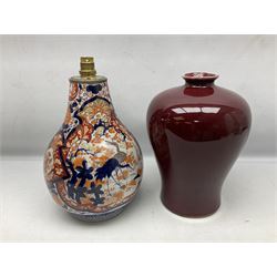  20th century Chinese Sang De Boeuf baluster form vase, together with  famille rose 'Wu Shuang Pu' style vase, a vase of baluster form depicting the immortals and another vase converted into a lamp 
