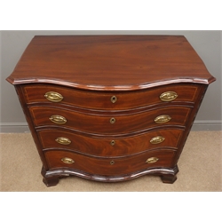  Early 19th century mahogany serpentine front chest, moulded top above four long graduated cockbeaded drawers outlined with chequer banding and with oval brass handles, enclosed by blind fret carved canted angles, on ogee bracket feet, W100cm, H93cm, D53cm  