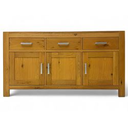 Light oak sideboard, fitted with three drawers and three cupboards, metal handles