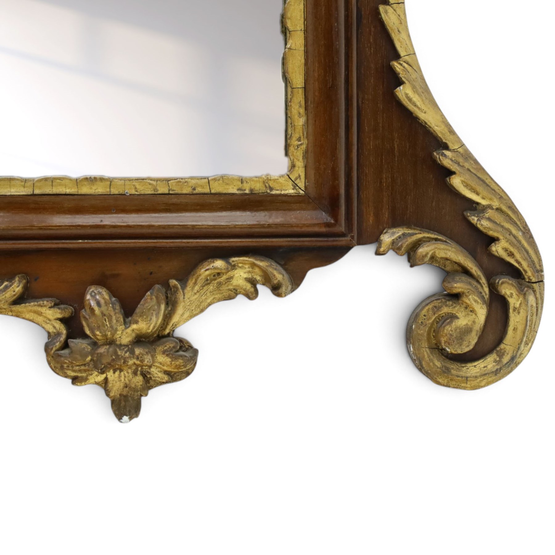 George III Chippendale design mahogany and parcel-gilt tripartite fret mirror with Hoho bird pediment