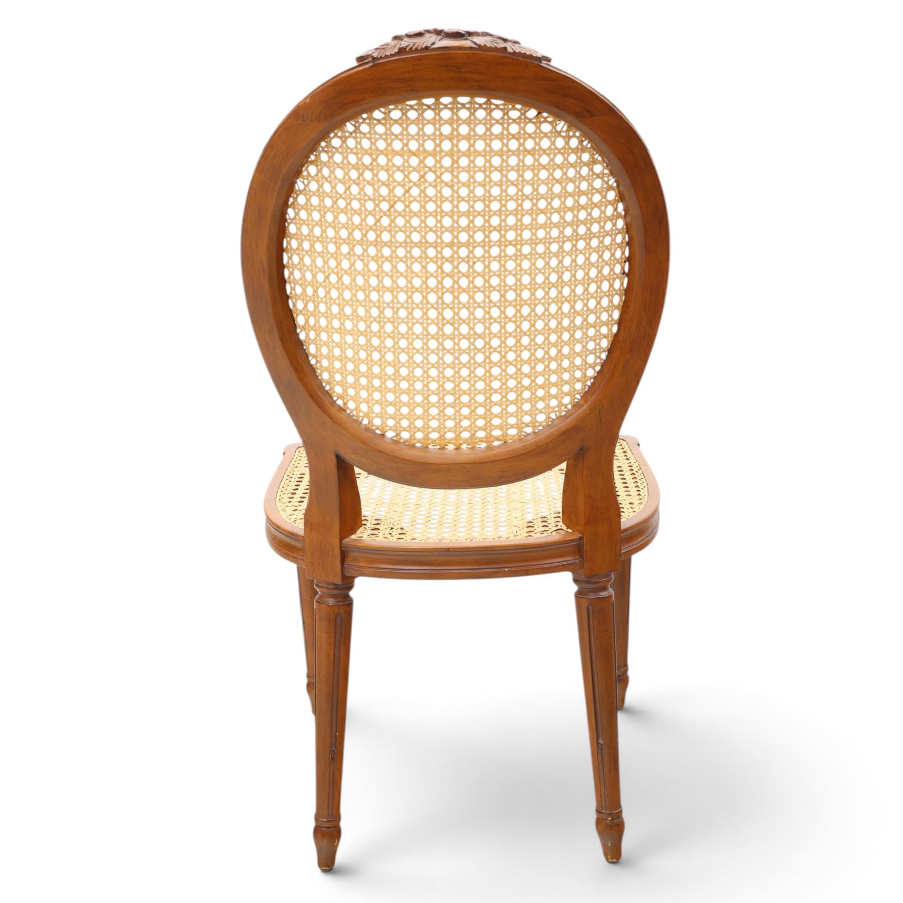 And So To Bed - French design 'Floral Caned Chair', balloon caned back with foliate carving, above a caned serpentine seat, reeded and turned supports