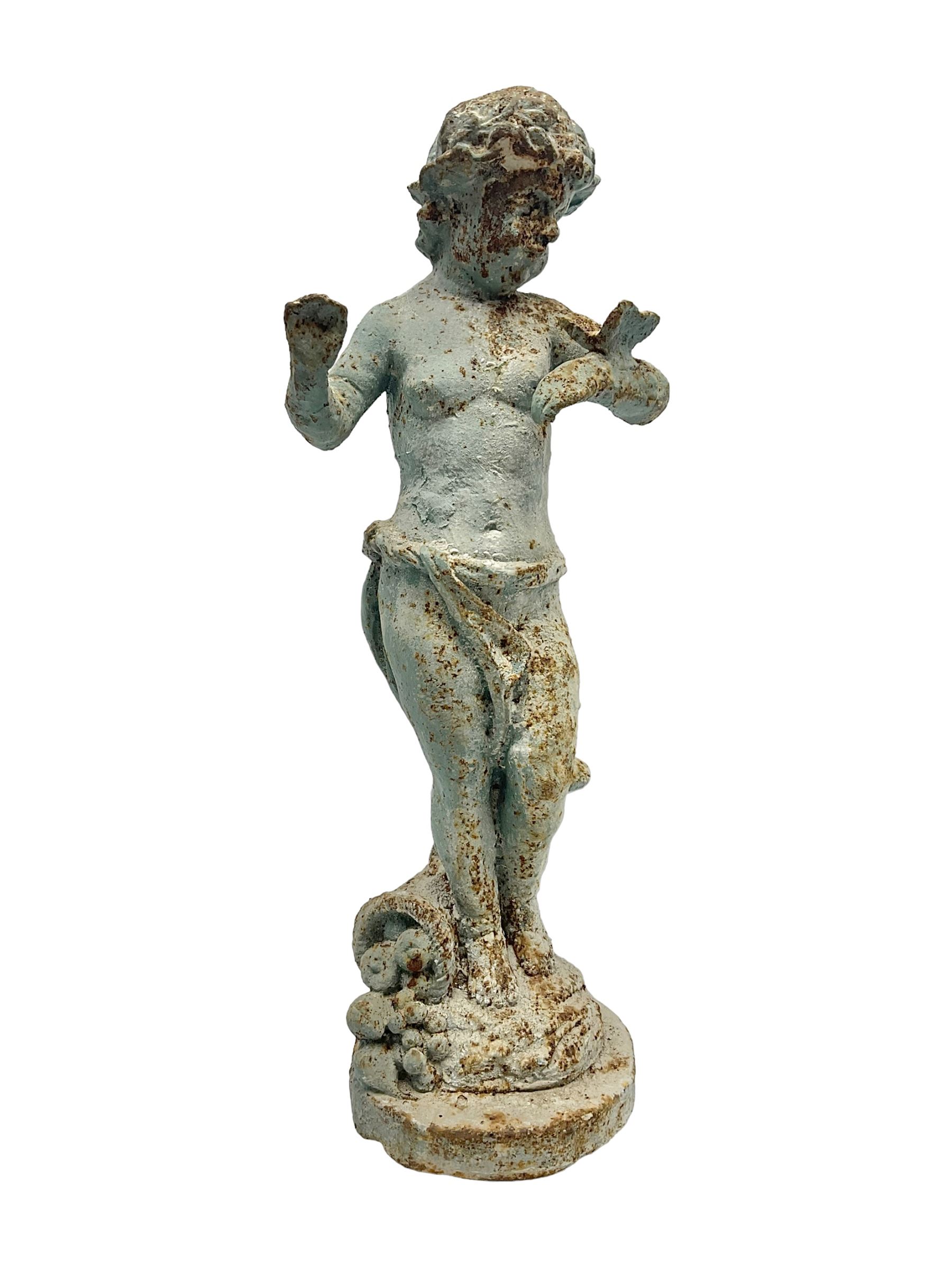 Garden ornament modeled as a putti with butterfly, H50cm