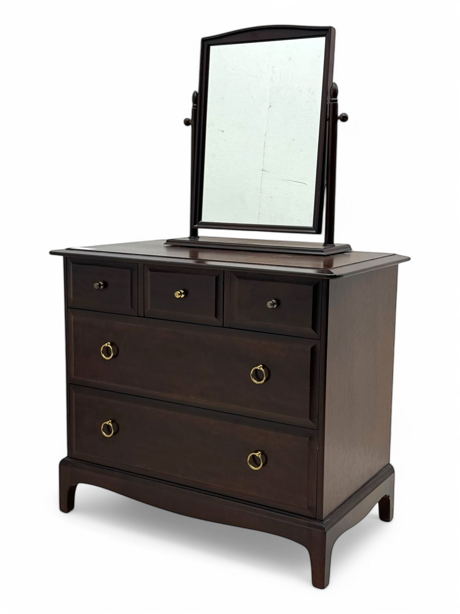 Stag Minstrel - mid-20th century mahogany dressing chest, rectangular top over three short and two long drawers, on bracket feet; matching swing mirror on turned supports