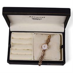9ct gold ladies Accurist wristwatch, on 9ct gold strap, hallmarked