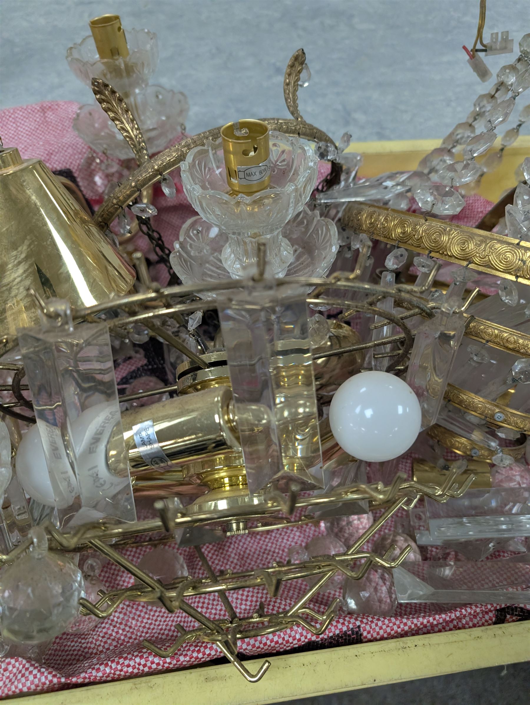 Four brass and glass chandelier light fittings