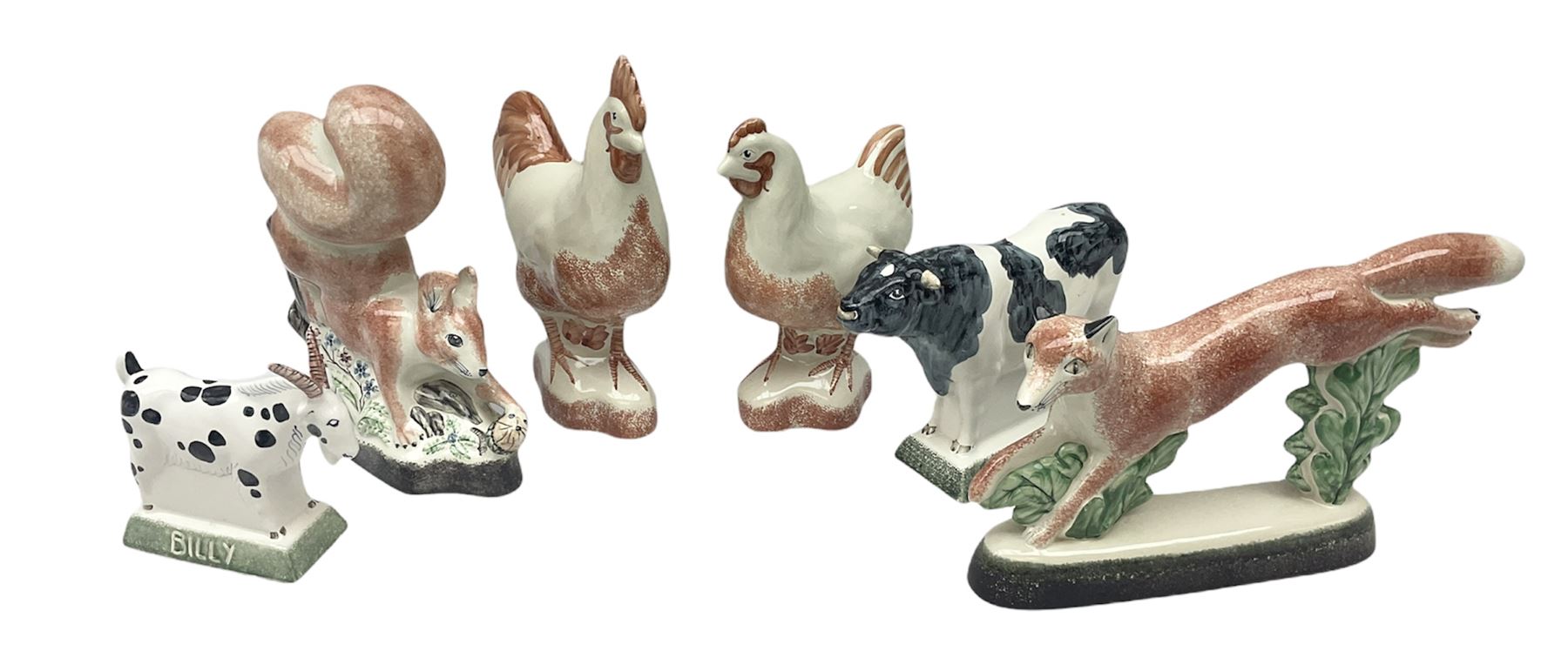 Six Rye Pottery figures, comprising, jumping fox, squirrel upon a branch, billy goat, bull, chicken and cockerel  
