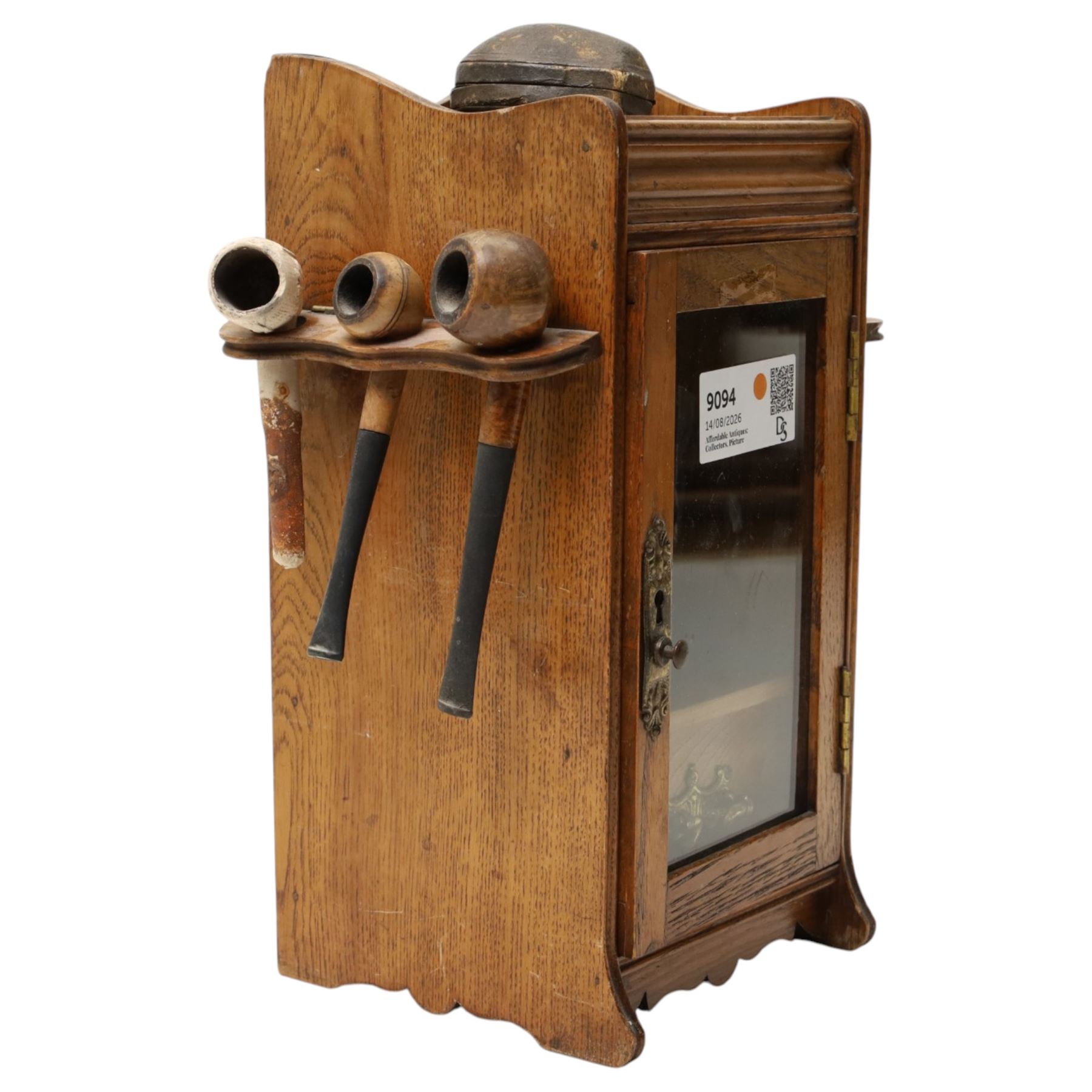 Small Edwardian oak smoker's cabinet with tobacco jar, Meerschaum pipe, three clay pipes, cigar cutter etc
