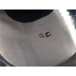 French silver cup and saucer, with embossed floral decoration throughout and openwork floral handle, stamped with Minerva's head and maker's mark for 	P. Fres Paris, cup H5.5cm