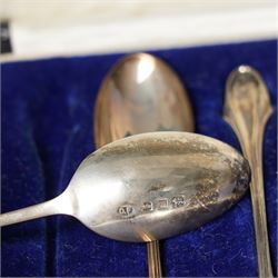 Set of six silver coffee spoons with shaped terminals, cased London 1924, another set of similar spoons London 1924 cased and a set of six silver bead knop spoons Birmingham 1936, cased