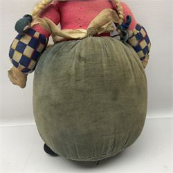 Farnell Alpha Toy soft toy of a Dutch girl, the pressed felt head with applied hair and painted features and overstuffed full length dress with apron and clogs; inoperative clockwork musical movement H31cm
