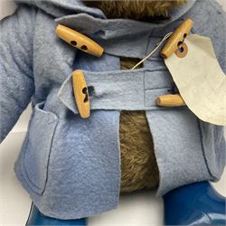 Paddington Bear with plush covered body, brown felt hat, pale blue duffle coat and blue wellingtons H54cm
