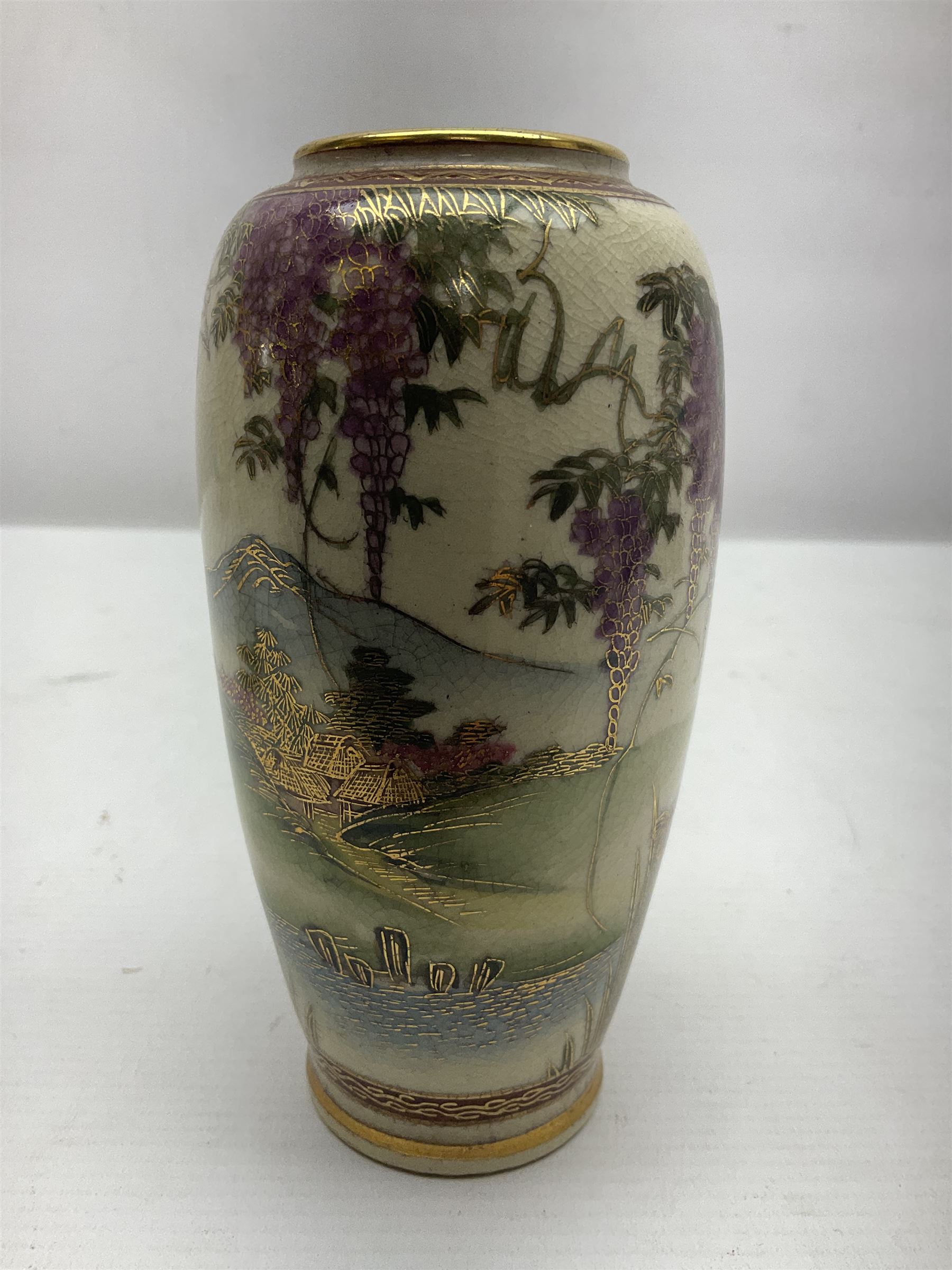 Japanese Satsuma Meiji period vase painted with a mountainous river landscape scene with wisteria and irises; together with a pair of similarly painted small dishes, signature beneath, vase H15cm