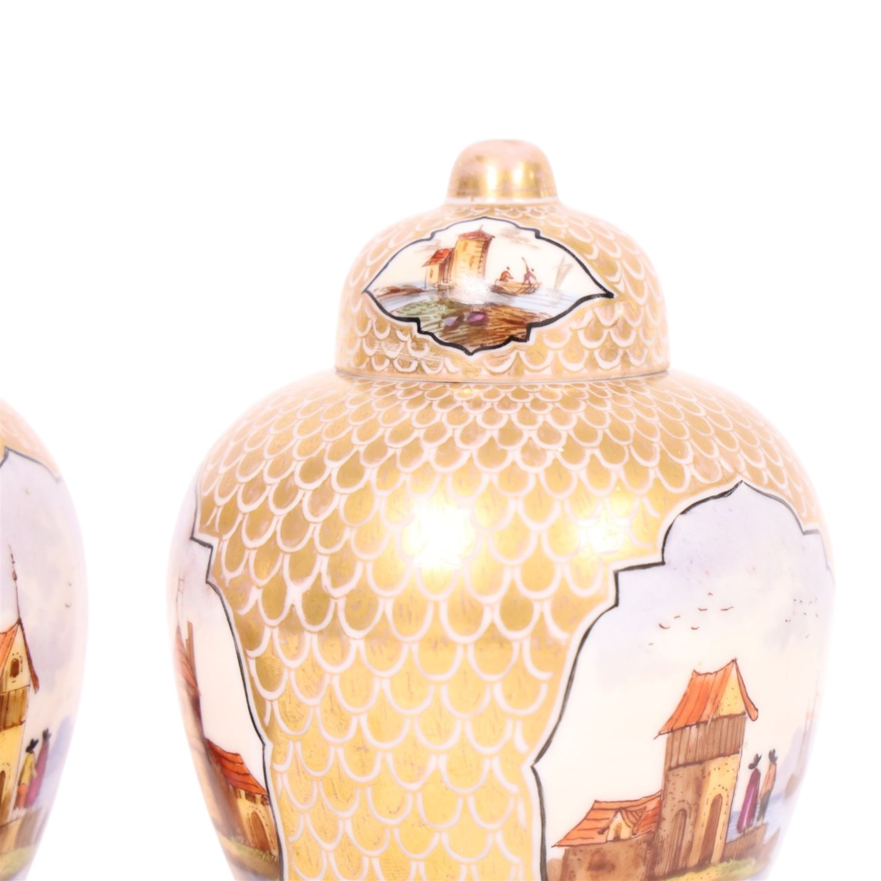 Pair of 19th century Dresden urn and covers, the central panels decorated with figures in landscapes, surrounded by gilt decoration, H15cm 