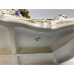 Capodimonte figure group of a horse drawn carriage with two horses pulling an open carriage with a male with dresden lace cuff and a female with full dresden lace skirt,  on a naturalistic base, H15.5cm