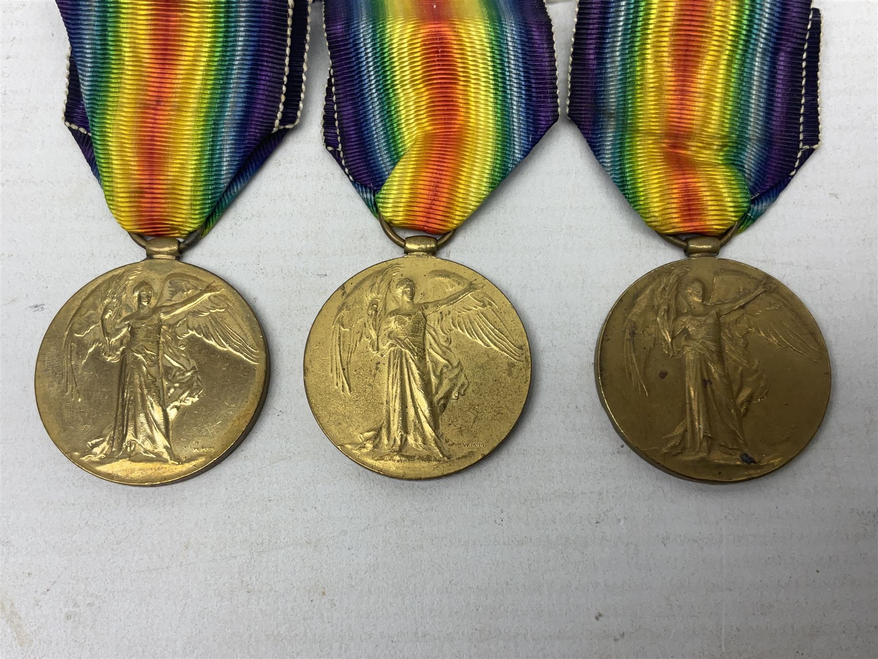 Five WW1 Lincolnshire Regiment Victory Medals awarded to 42327 Pte. T Davison; 29878 Pte. J.W. Simpson; 21702 Pte. H. Archer; 41348 Pte. J.A. Hart; and 9874 Pte. N. Ellis; some biographical information; all with ribbons (5)