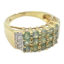 Gold three row green amethyst ring, each end set with four round brilliant cut diamonds, stamped 14K