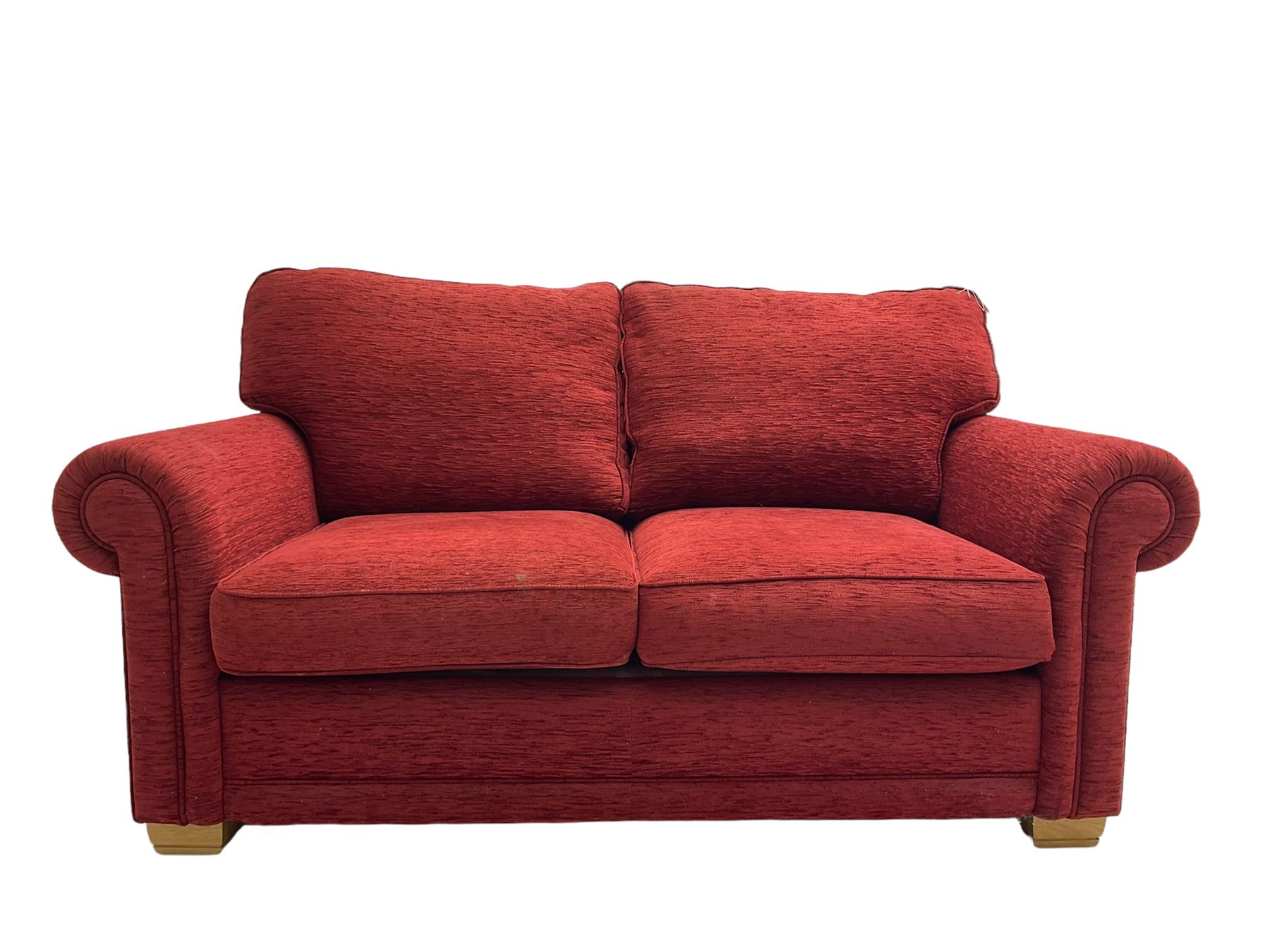 Two seat metal actions sofa bed upholstered in red cover