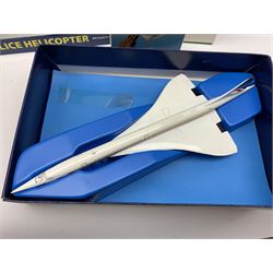 Three Schabak 1/250th scale die-cast models of Concorde, all boxed; nine boxed promotional models of airliners; Richmond Toys model of Wiltshire Police Helicopter and Air Ambulance, boxed; nine unboxed die-cast models of aircraft; and factory sealed Airfix plastic model kit of a Supermarine Spitfire VB