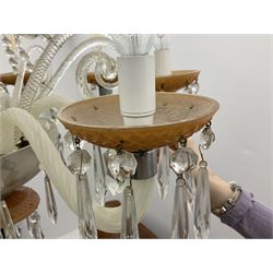 Eight branch milk glass chandelier, the ribbed central stem with eight wrythen twist scrolling branches and amber glass drip trays, with further decorative scrolling branches extending to frosted glass bowl above amber glass dome, with lustre droppers and chains throughout H approx 48cm excl bottom droppers